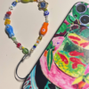 swishing fish phone charm