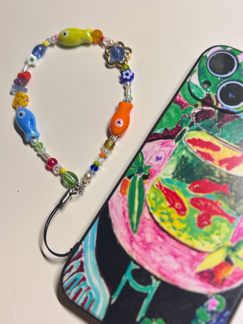 swishing fish phone charm